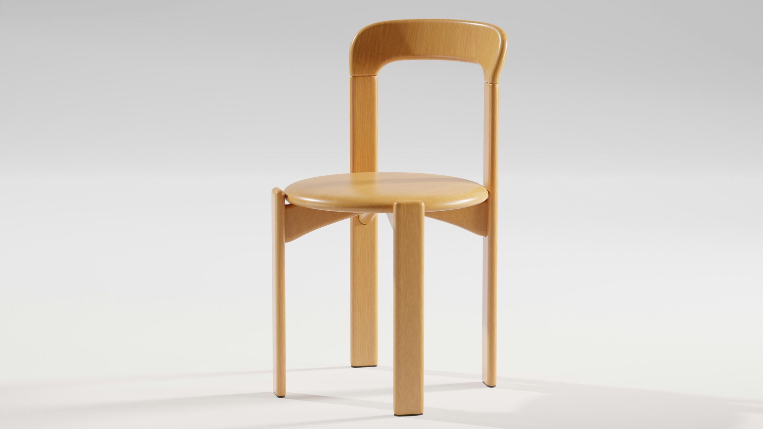 Detail of a light wood molded chair shell, the construction an Eames chair replica copies